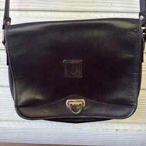 Hartmann Vintage Black leather shoulder Bag with storage bag and card